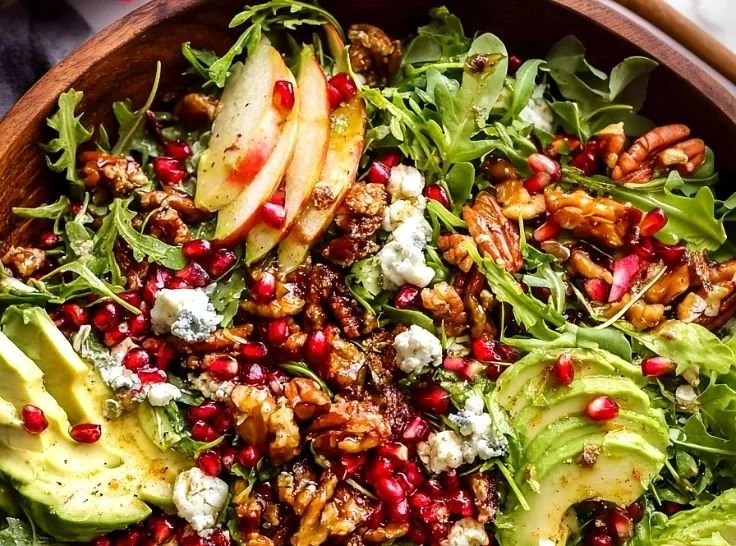 Winter Christmas Salad with Honey Mustard Dressing in a festive bowl